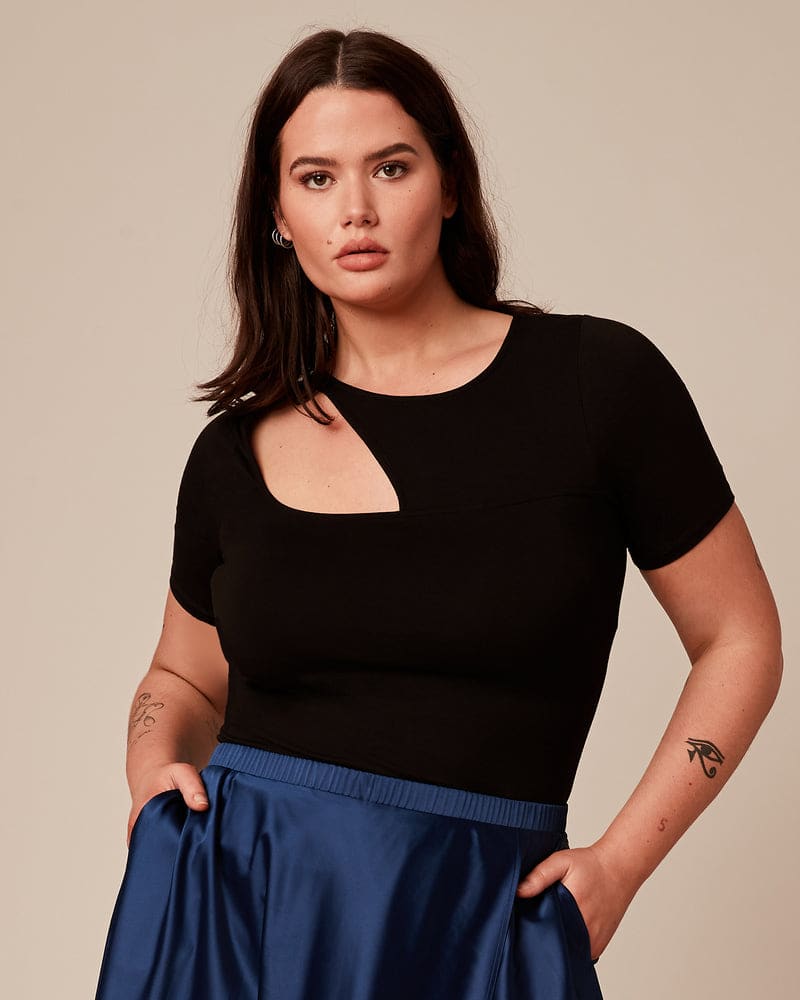 Front of a model wearing a size 2 Jackie Top in Black by 11 Honoré Collection. | dia_product_style_image_id:224047